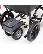 The compact PowerStroll wheelchair powerpack attached to a transit wheelchair