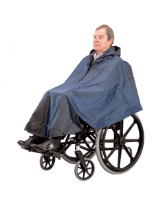 A happy man wearing a blue weather resistant wheelchair cape complete with hood