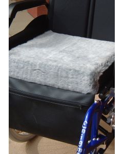 Fleece cushion fitted on to a wheelchair