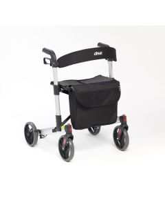 The X Fold rollator shown from the side angle with shopping bag visible